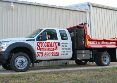 Custom vehicle graphic on landscaping work truck